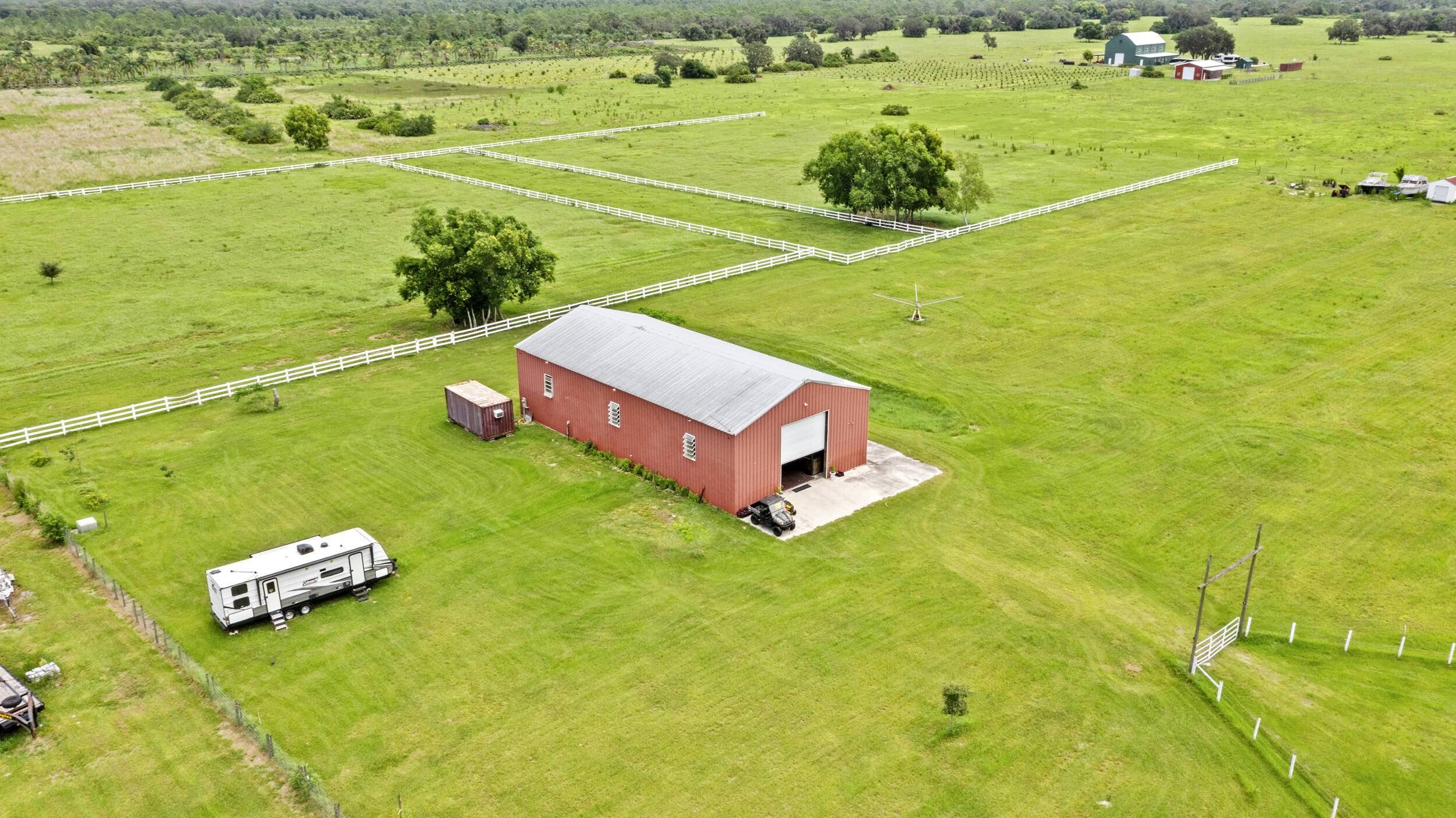 Embrace country living at its finest on this stunning 20 acre farm in Indiantown.