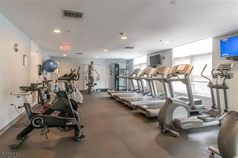 Luxurious southeast facing corner two bedroom, two bath residence offering approximately 1, 251 sq.