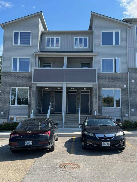 A recently constructed stacked townhouse is featuring three bedrooms and three bathrooms.