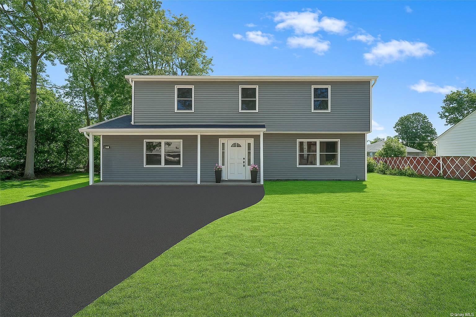 Fully Renovated Home with Two Living Spaces Ideal for Homeowners or Investors !