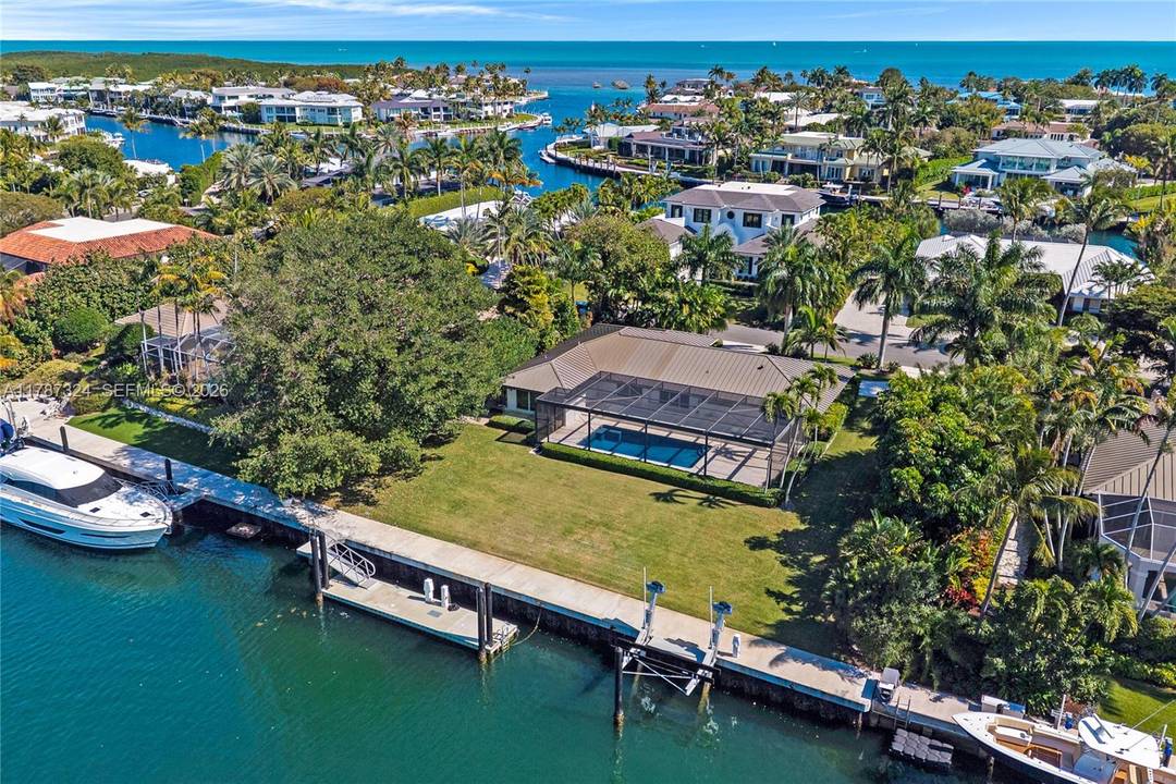 Tastefully remodeled canal front home in the heart of Ocean Reef Club.