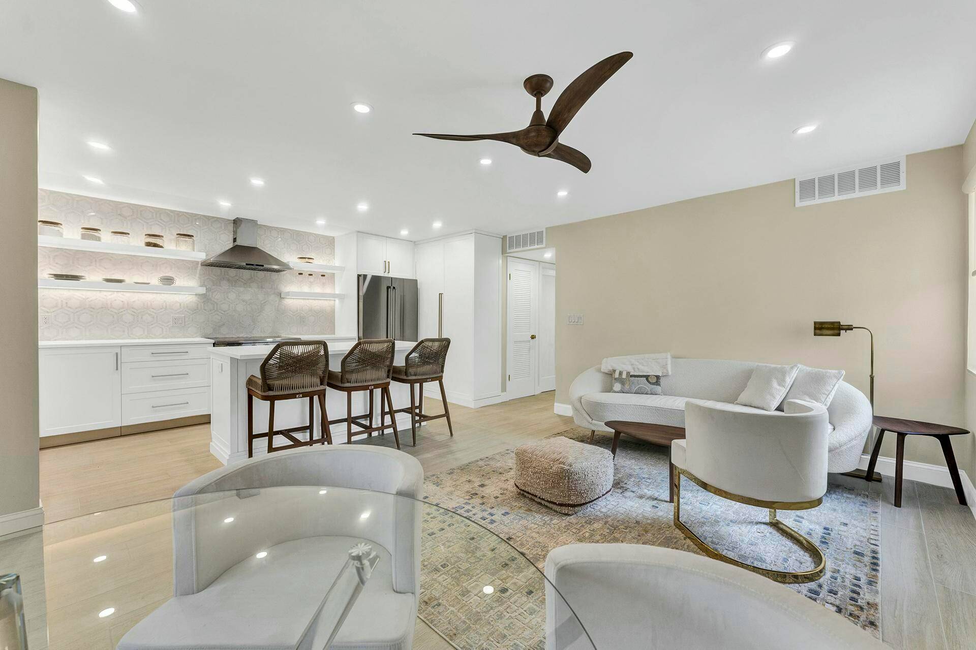 Discover coastal living at its finest in this desirable corner unit in East Boca Raton.