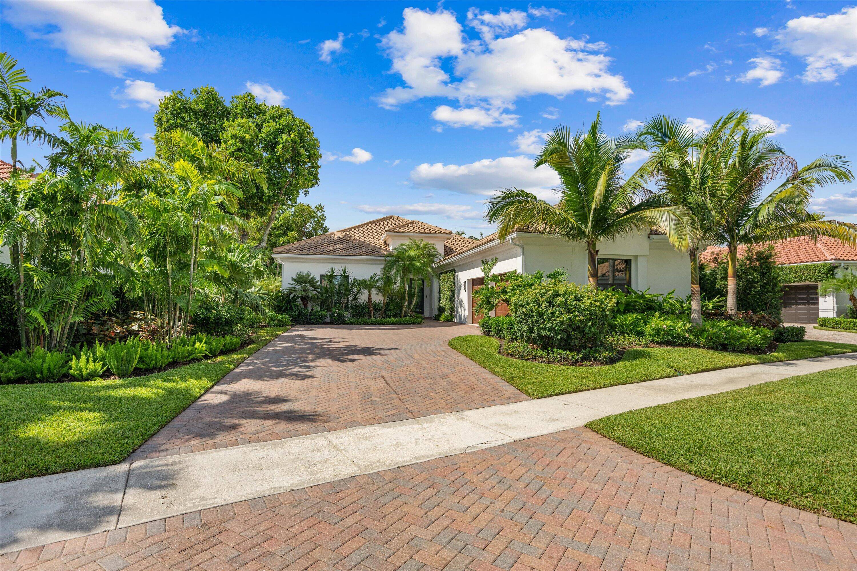 Spend the season in this exceptionally renovated home in the prestigious Equestrian Club Estates.