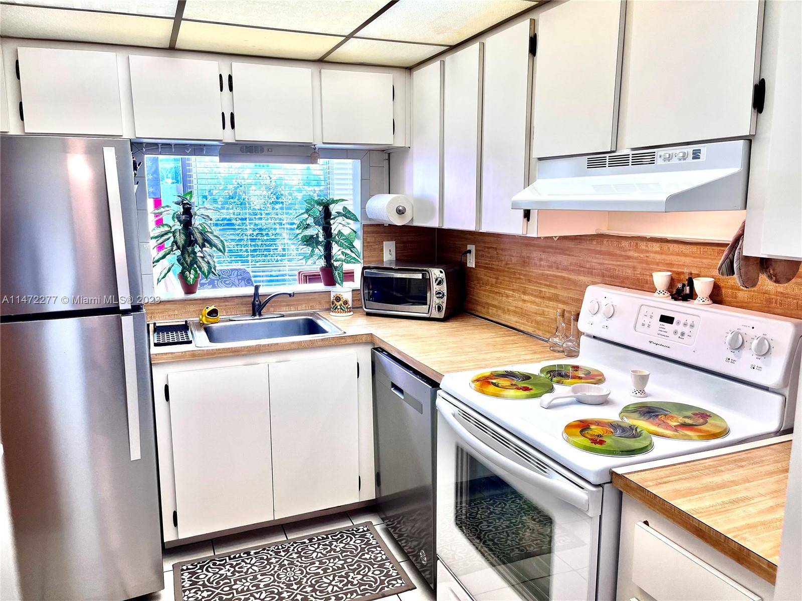 Welcome to the exquisite Versalles Gardens II, a vibrant community nestled in the heart of Miami.