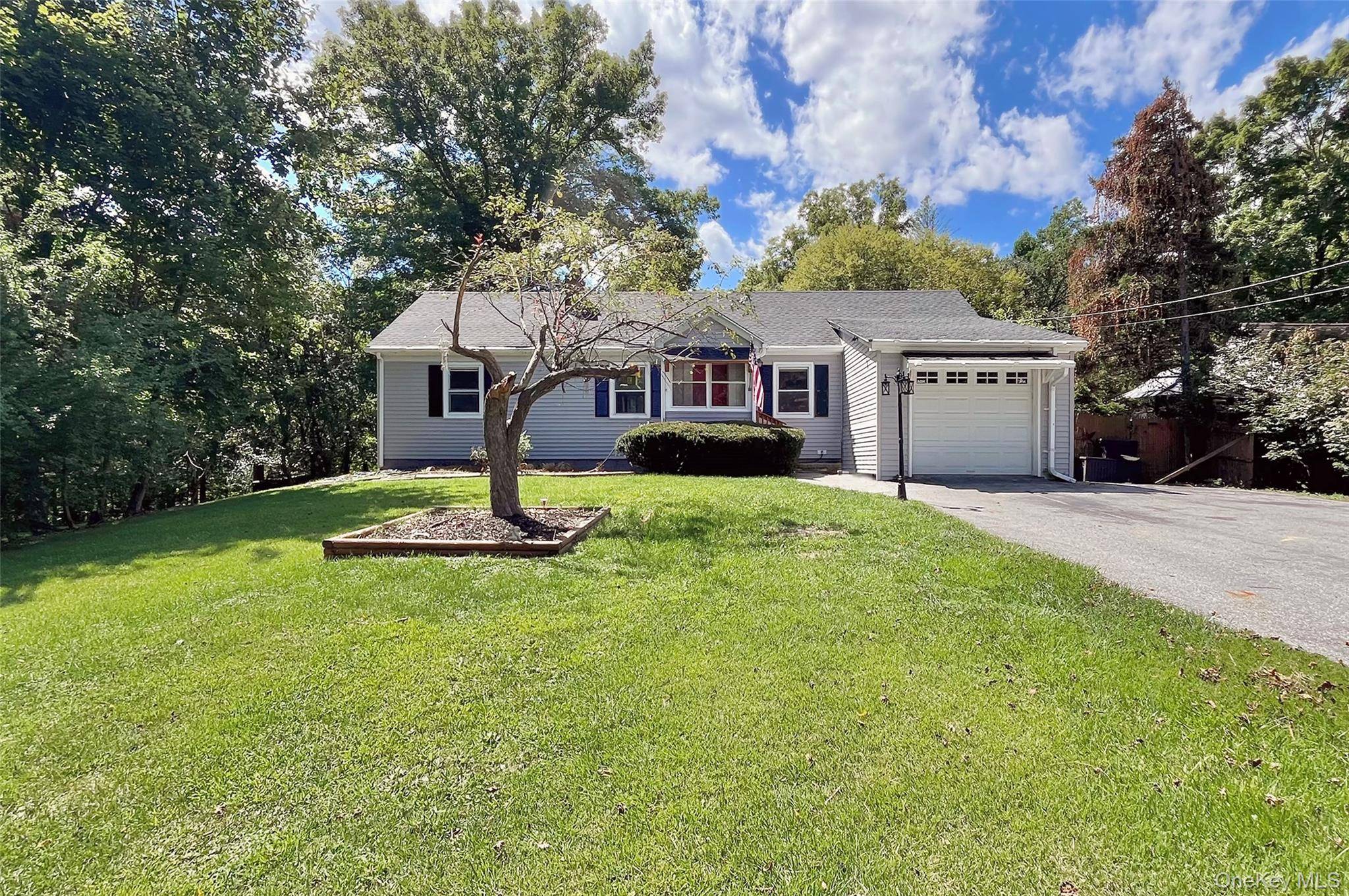 Welcome to this beautifully maintained 3 bedroom, 2 bath home tucked away on a quiet cul de sac in Poughkeepsie.