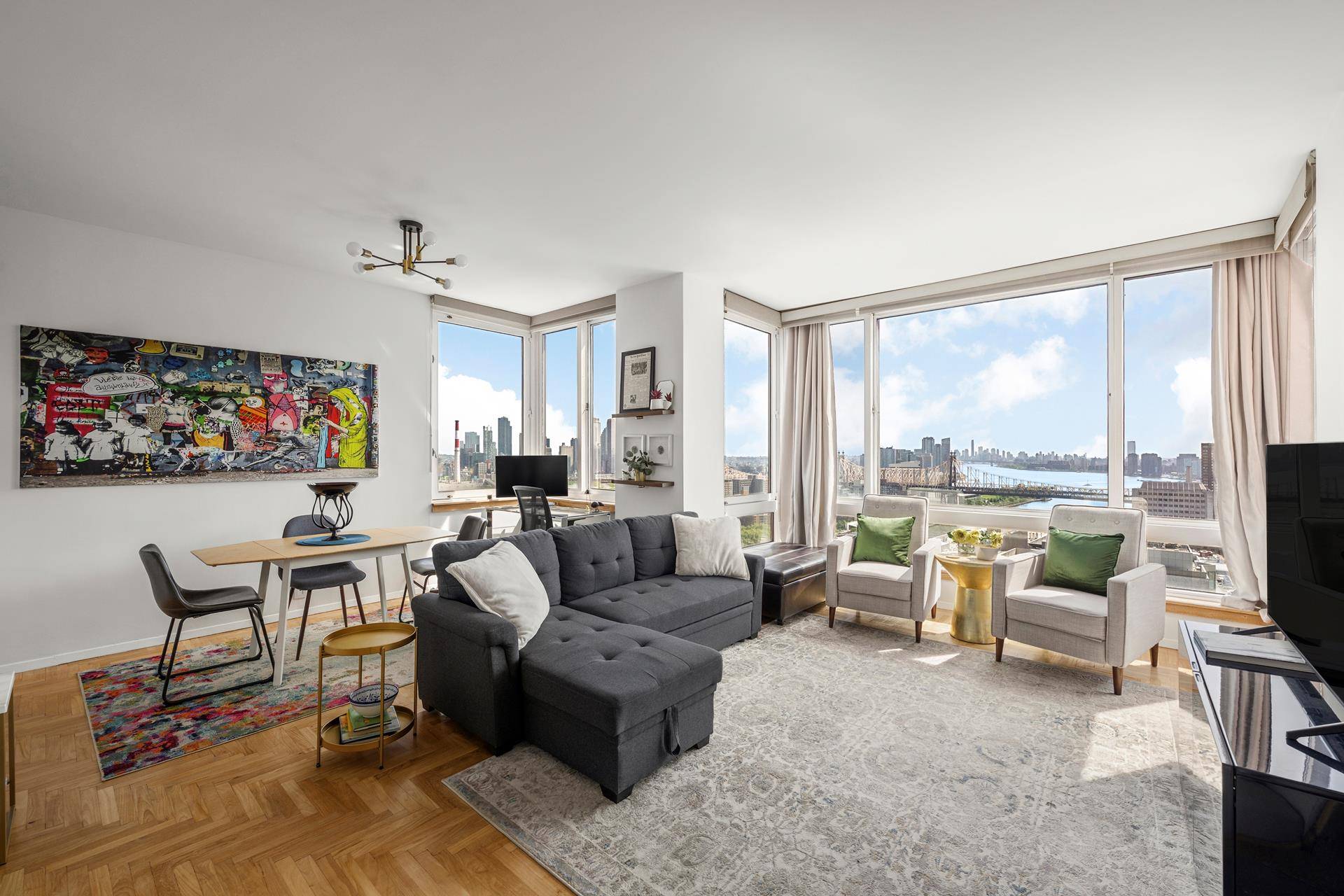 Enjoy sun filled living and sweeping East River views in this oversized 1 bedroom, 2 bathroom home at The Belaire Condominium.