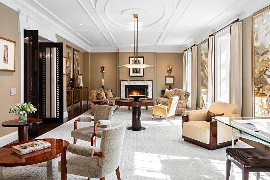 Ideally located on East 71st Street and situated in one of Park Avenue s most prestigious and sought after pre war cooperatives, this triple mint high floor duplex residence is ...