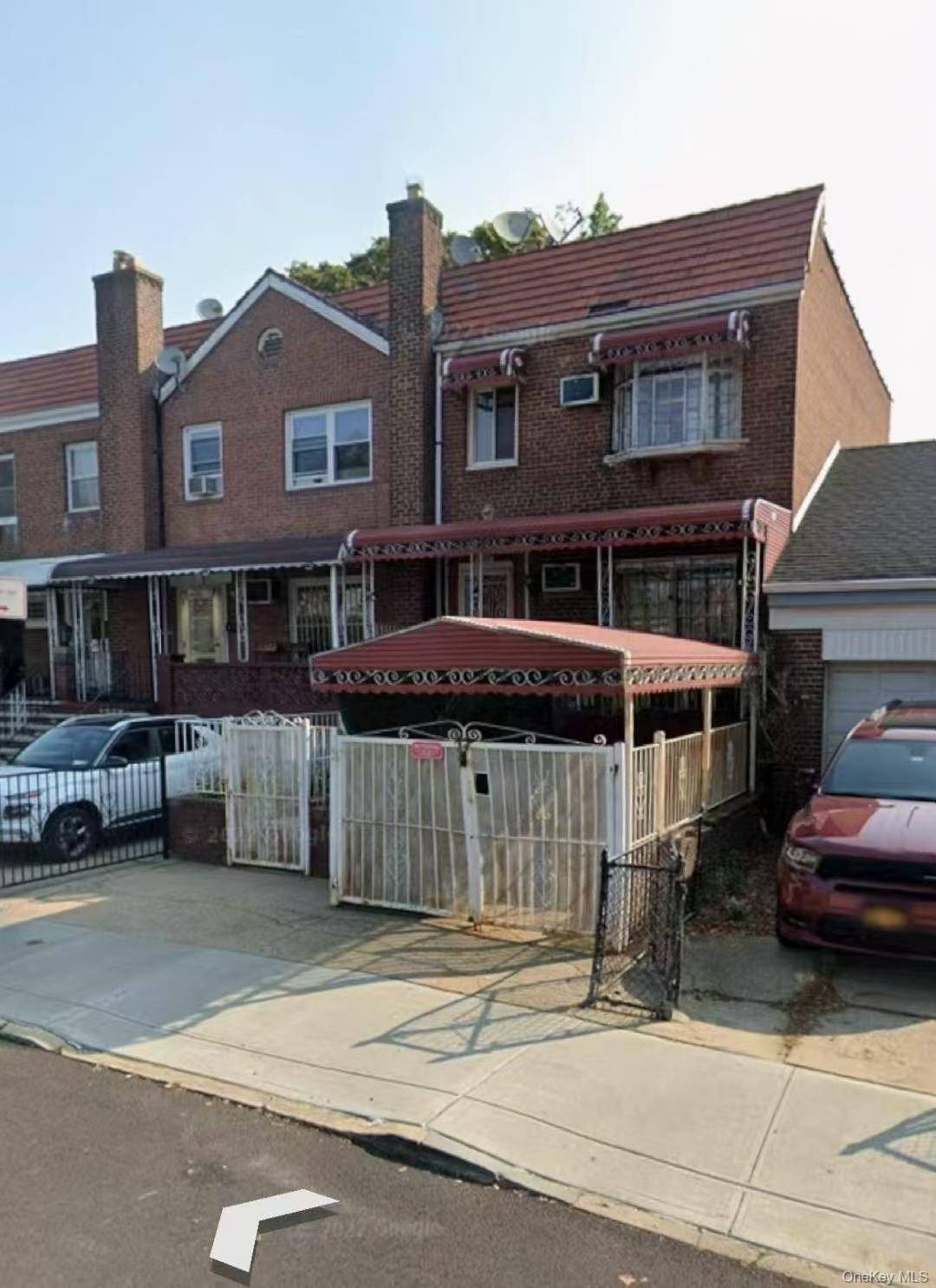 One family Semi Attached Brick 3 levels at East Elmhurst Queens.