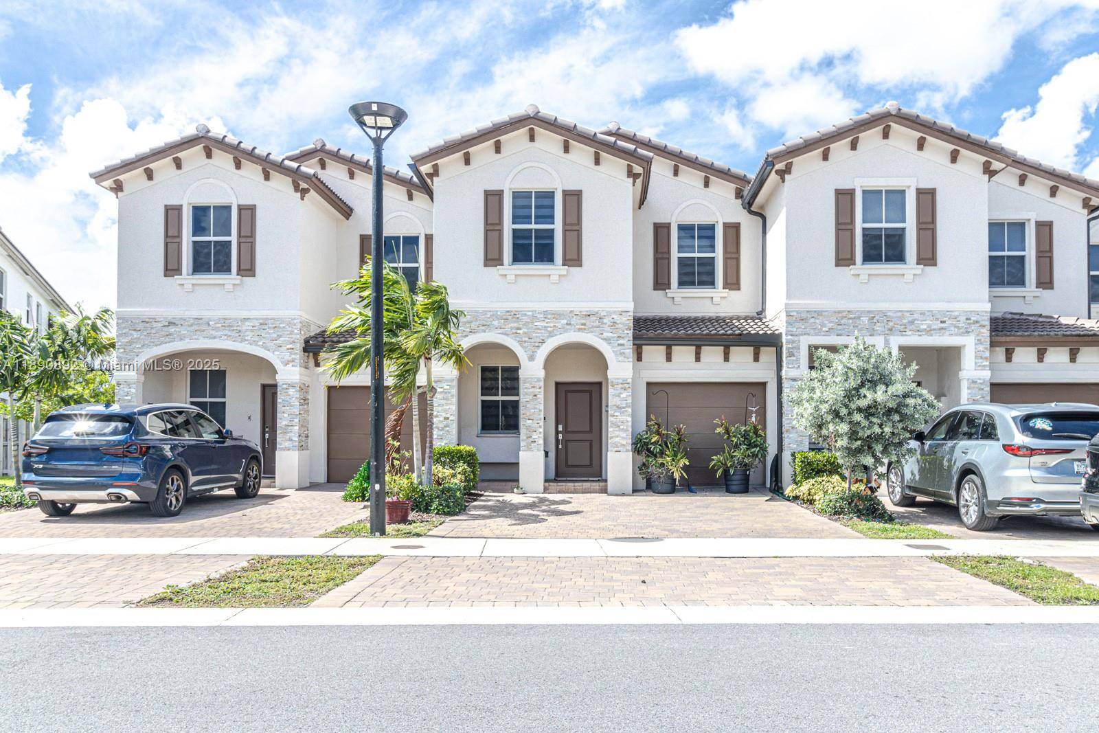 Newly built 3BD 2. 5BA Townhome offering bright, modern interiors w tile downstairs and carpet upstairs.