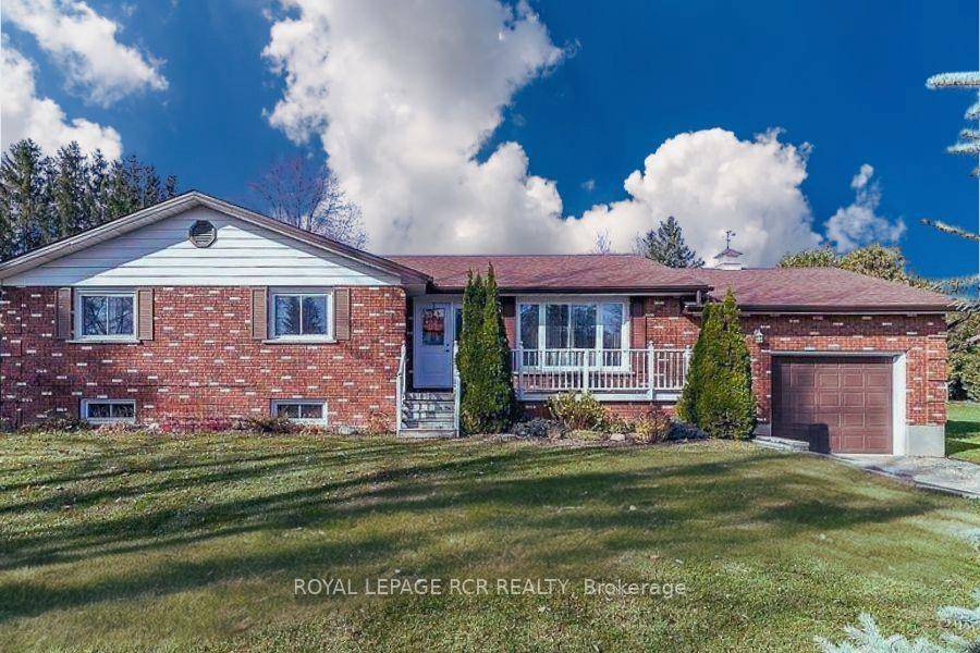 Discover this delightful 3 bedroom, 2 bathroom bungalow nestled on nearly half an acre fully fenced yard in the heart of Belwood.
