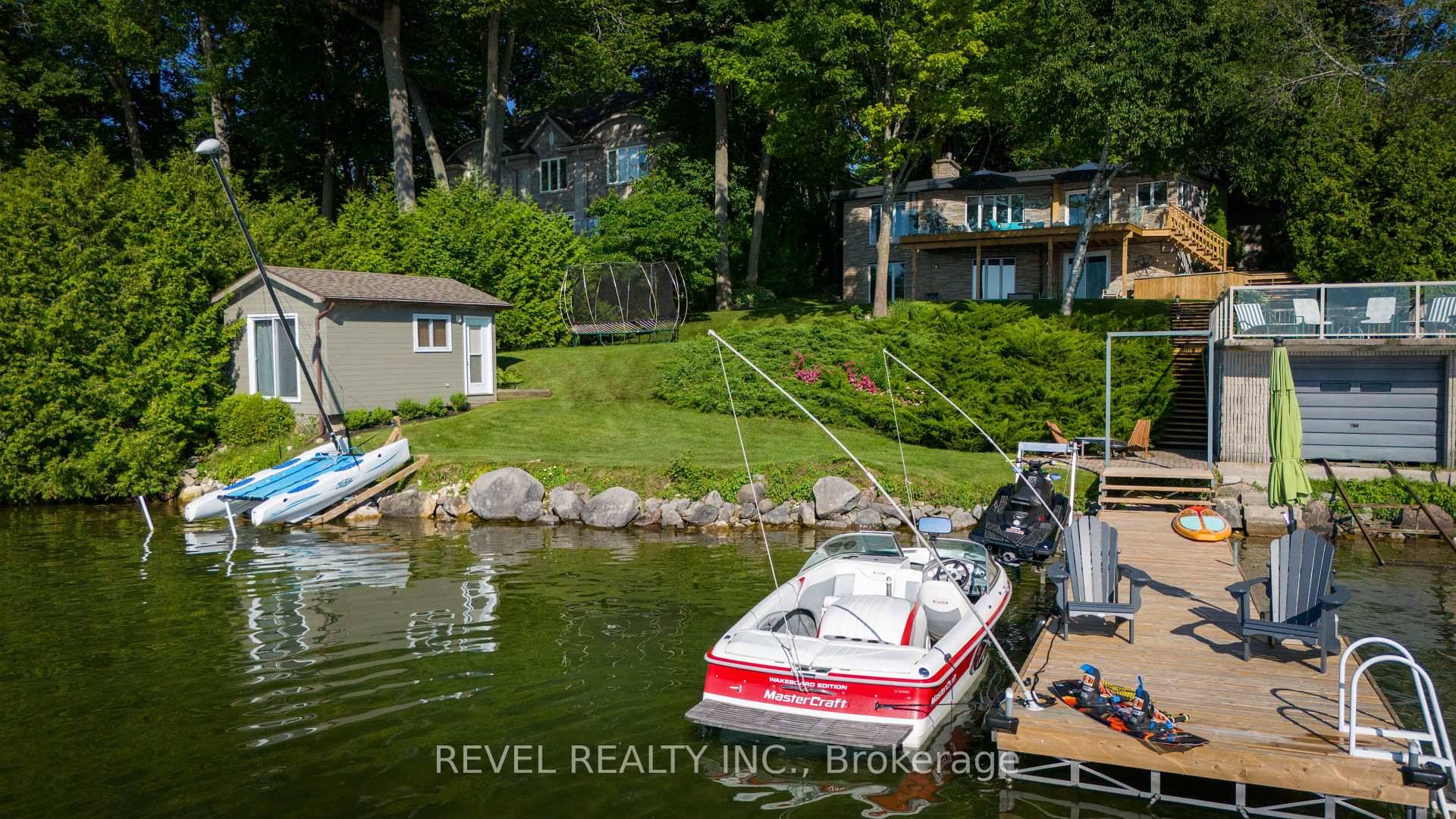 Welcome to this exceptional waterfront retreat offering unparalleled views of Lake Couchiching and showcasing over 2900 square feet of finished living space.