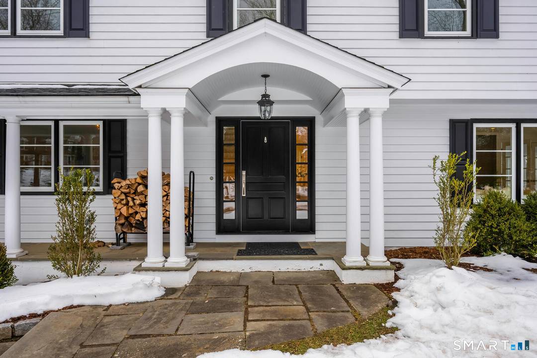 Set on a quiet cul de sac within Darien's prestigious Tokeneke Private Association, this beautifully updated 4 bedroom, 3.