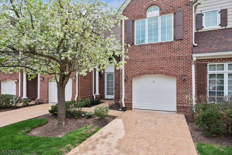 This beautifully updated townhouse will truly WOW you !