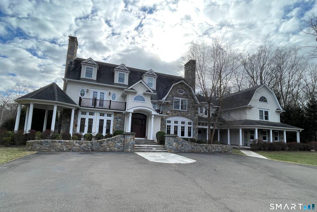 Located in the desirable Lake Wind Ponus Ridge corridor, this custom Colonial estate offers over 9, 000 square feet of living space, thoughtfully rebuilt in 2010 and designed for both ...