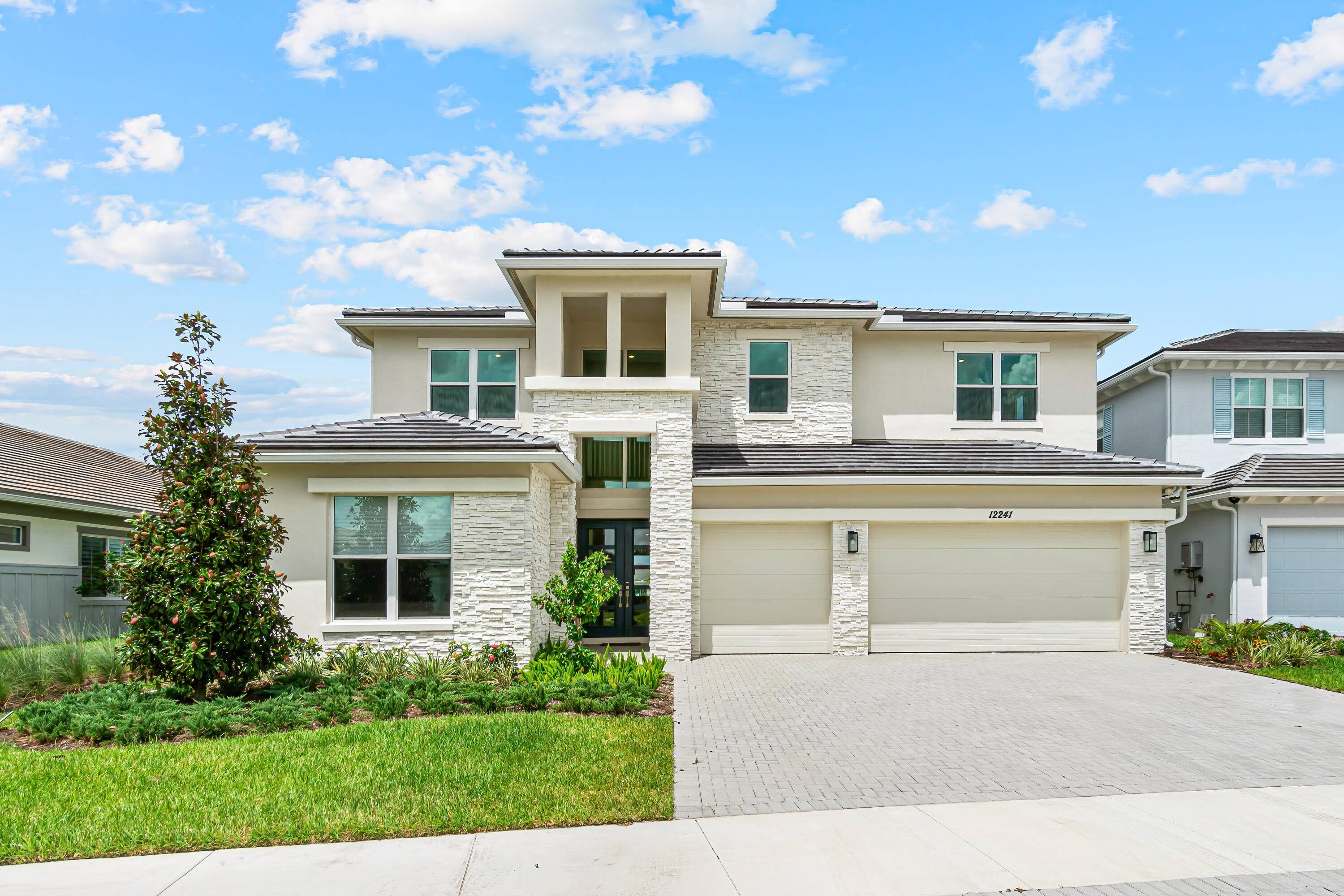 Welcome to 12241 Waterstone Circle, a newly built residence in La Terre at Avenir.