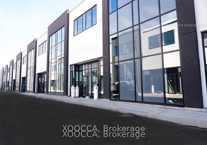 THIS IS AN ASSIGNMENT SALE New And Modern Industrial Unit With 28 Feet Height Located In One Of The Prestigious Business Parks In Gta.
