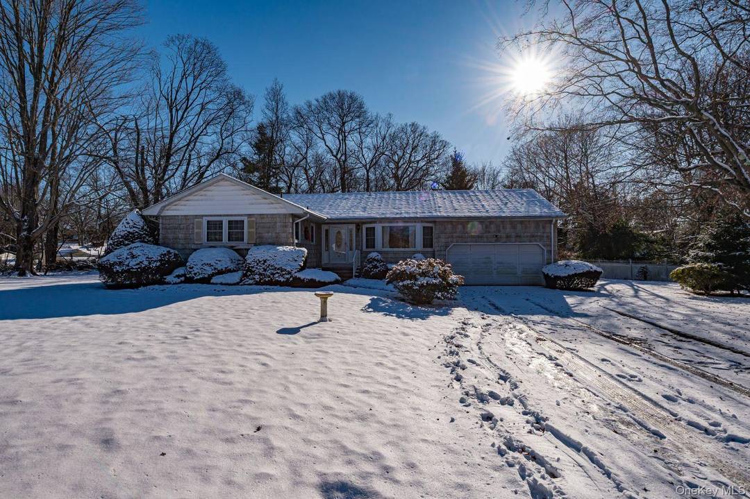 Rare Find ! ! Meticulously maintained spacious ranch set on a quiet, tree lined street on a beautiful half acre lot with a long driveway.