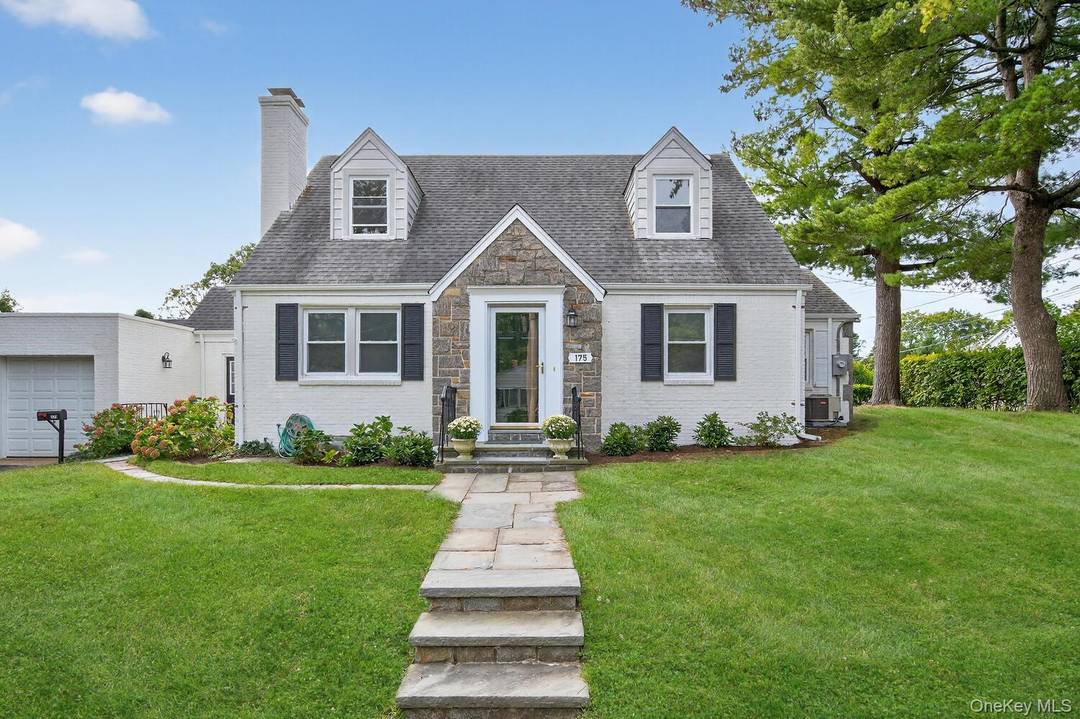 This completely renovated 3 bedroom, 2 bath residence is set on a desirable corner lot with a private yard and inviting terrace.