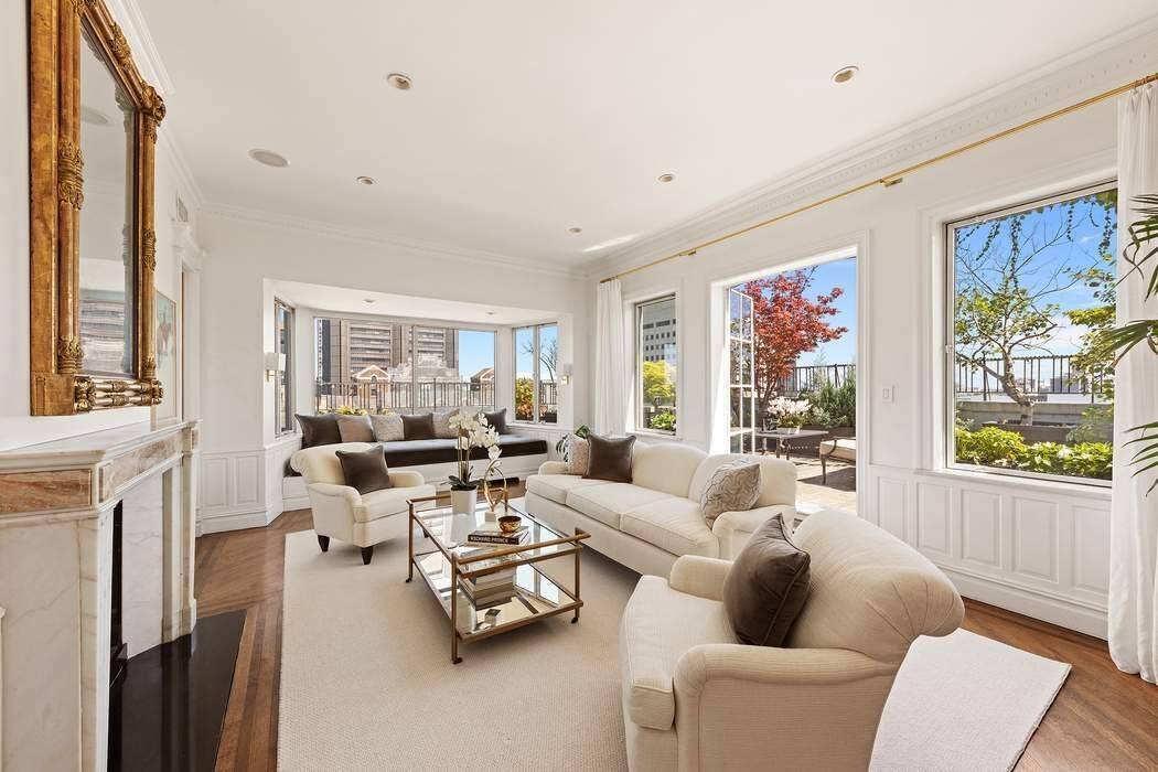 Enter this sun drenched duplex penthouse via your private elevator.