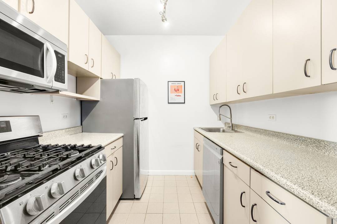 This thoughtfully designed split two bedroom, two bath residence offers an exceptional balance of space, light, and functionality.