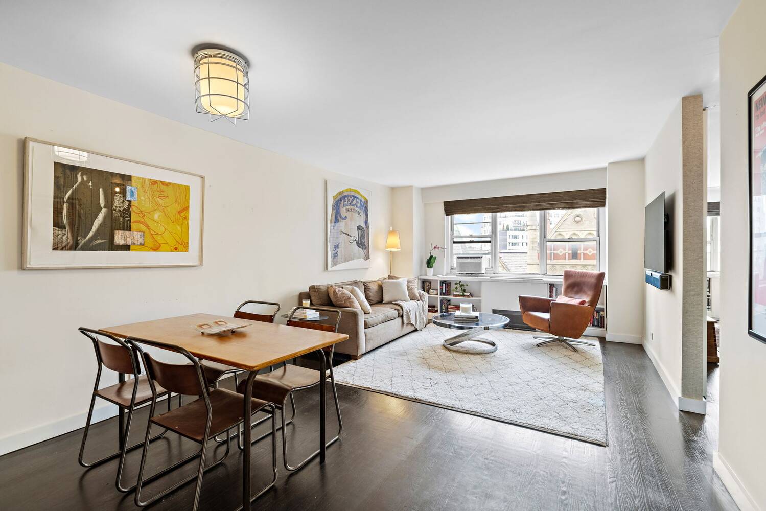 This beautifully renovated two bedroom, one bath corner home, offers breathtaking western views of the Jefferson Market Library.