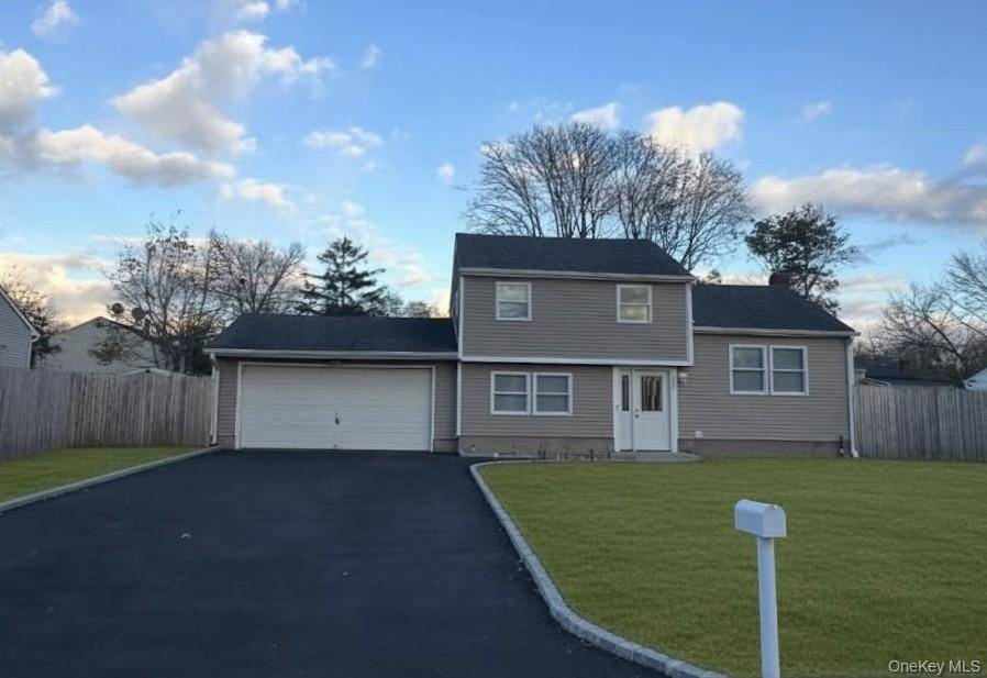 This charming 1960's home has been updated with all new windows, beautiful new kitchen with granite countertops and stainless steel appliances.