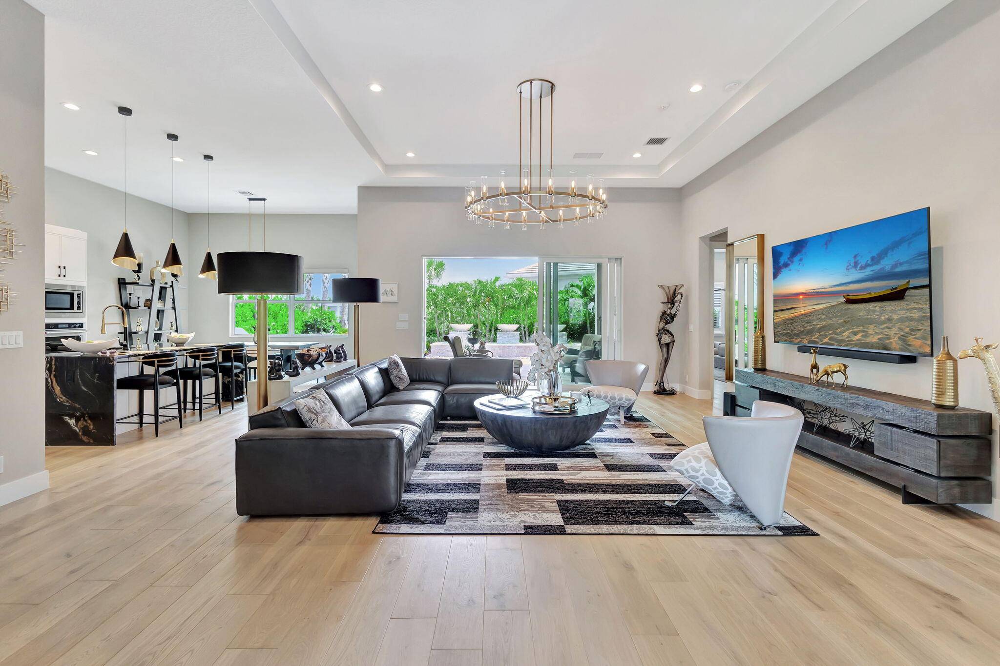 Stunning 3 bedroom, 3 bath and office single story home nestled in the premier Regency neighborhood located in the Avenir Community in Palm Beach Gardens.