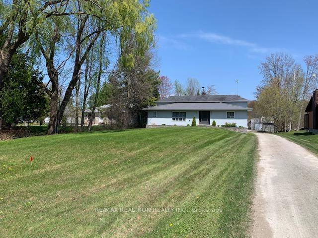Discover the charm of this waterfront home, perfectly nestled along a serene canal with direct access to picturesque Lake Simcoe.