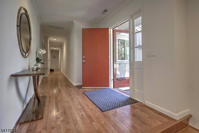 Perched on a scenic hill in the historic Ralston section of Mendham Township, The Treehouse at Roxiticus is a beautifully expanded three bedroom ranch that surprises at every turn with ...