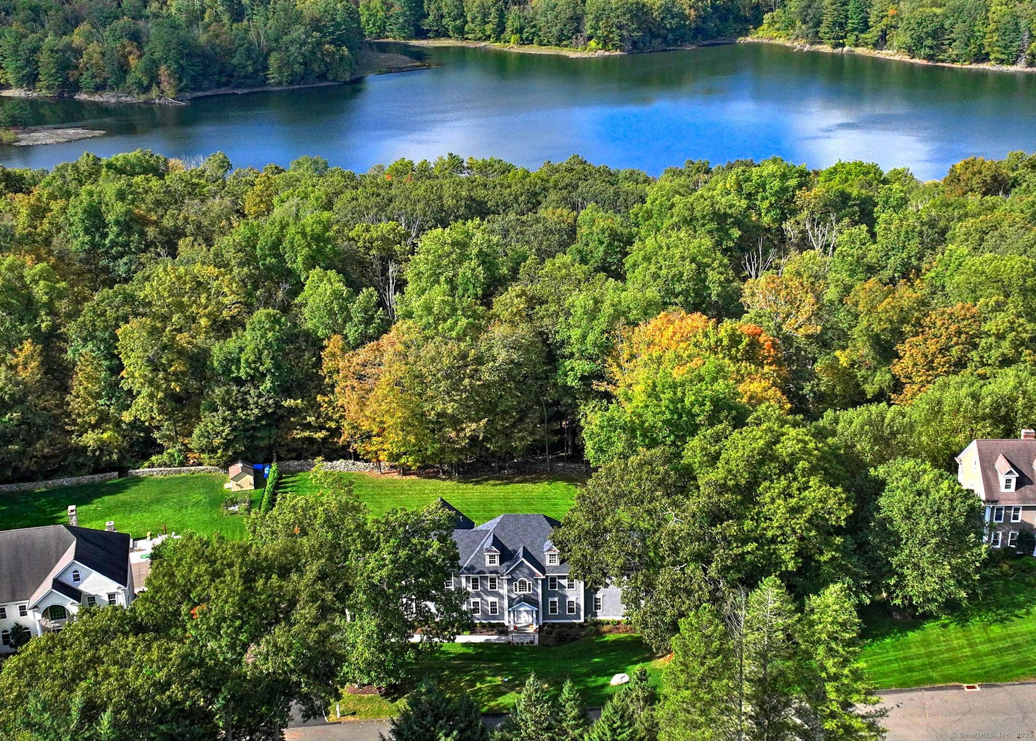 Welcome to your dream home in Trumbull's sought after Tashua Tree Farm where refined design meets everyday comfort.