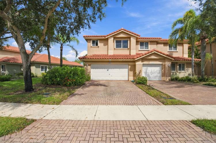 Beautifully updated 3 bedroom townhome in the highly desirable Fairways at Heron Bay !