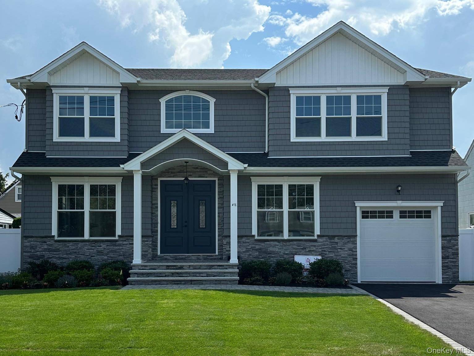 Nestled in the heart of Merrick this STUNNING 3200 sq ft home awaits you.
