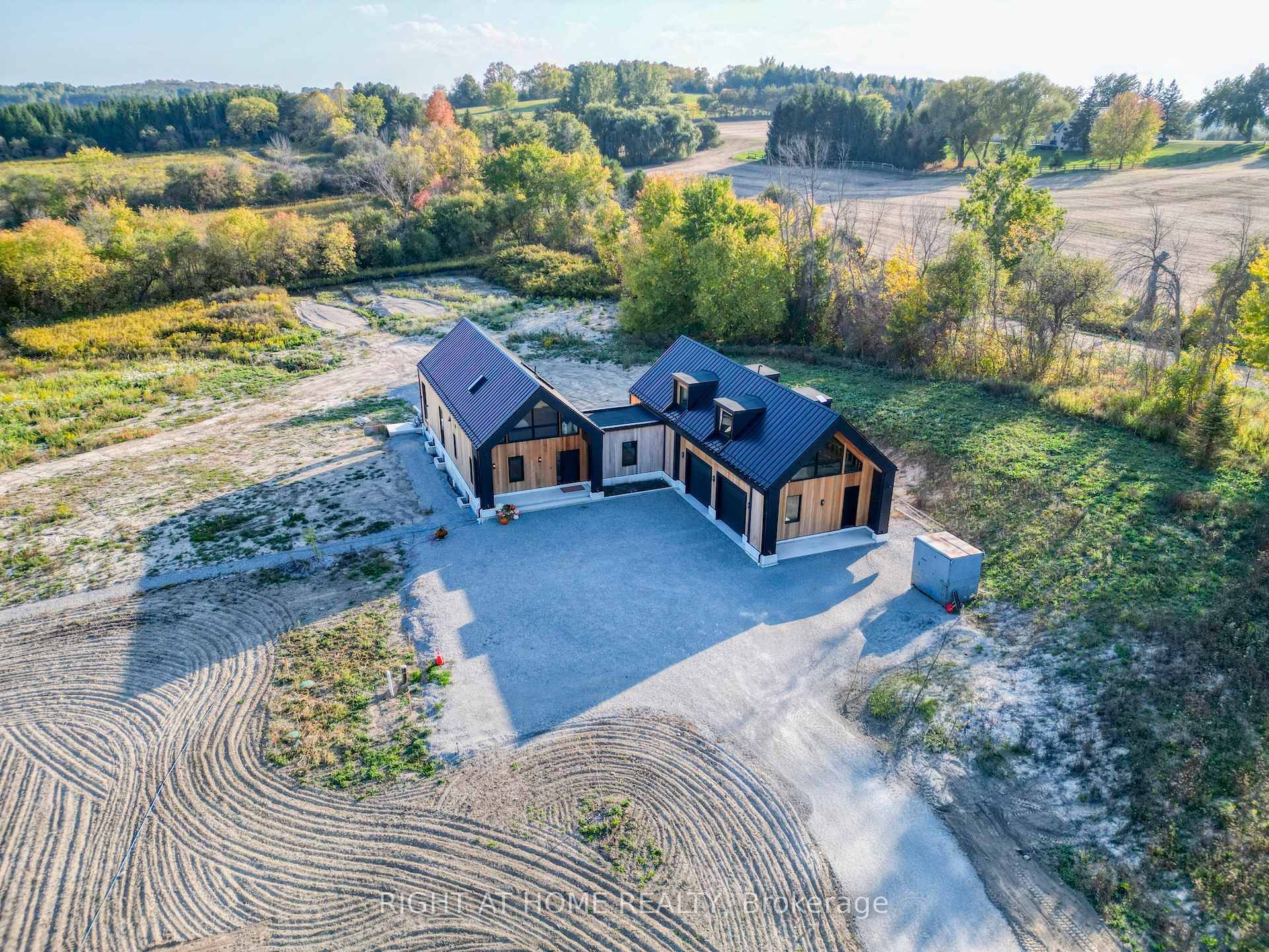 Discover the perfect blend of modern design and country serenity in this nearly new A frame cedar farmhouse set on over 65 acres of picturesque agricultural land.