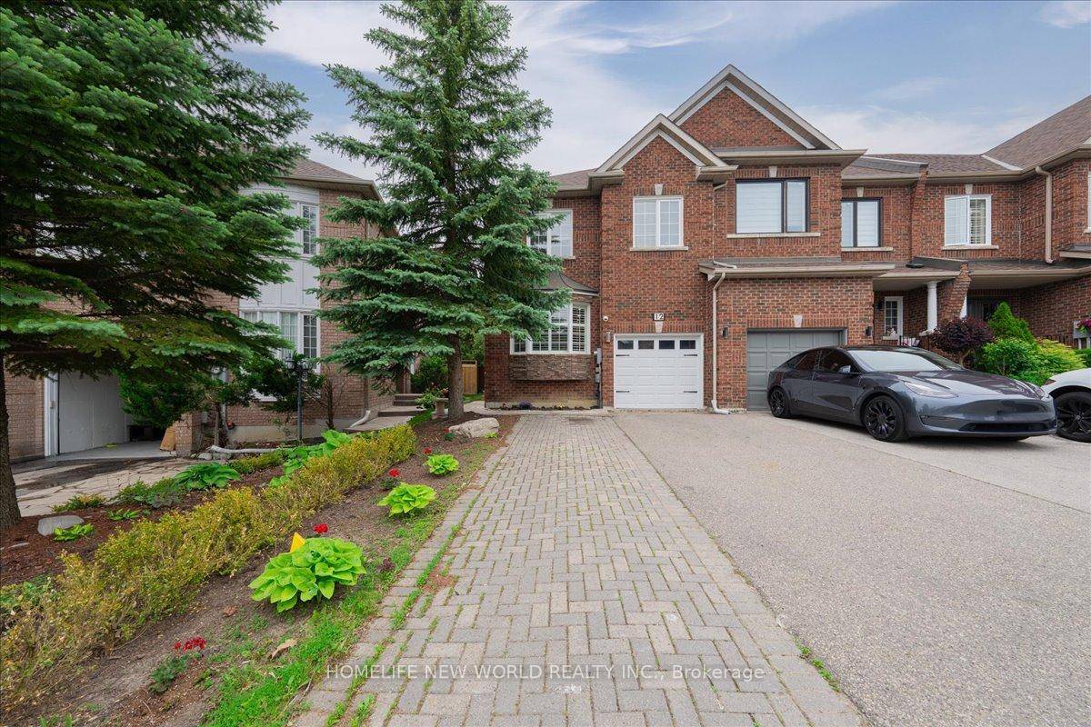 Stunning and spacious freehold end unit townhouse offering a total parking for up to five vehicles, located in one of the most sought after neighbourhoods of Richmond Hill.
