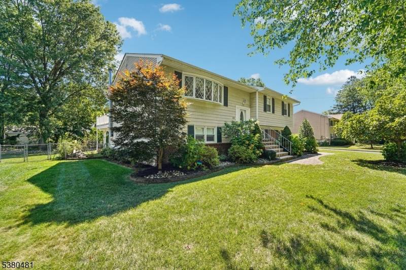 Nestled in a highly sought after neighborhood near beautiful Lake Parsippany, this stunning 4 bedroom, 2.
