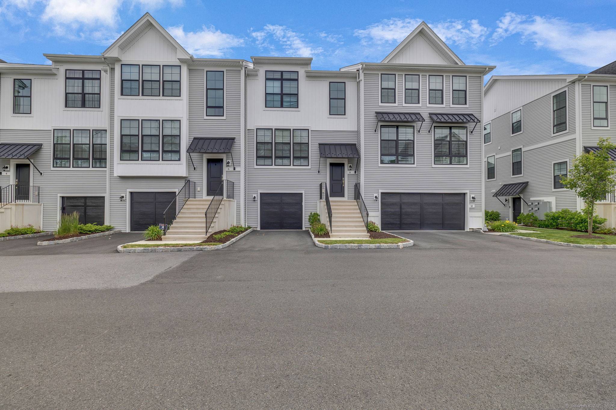 Located in The Rivington's Woodlands Collection, this nearly new 3 bedroom, 2.