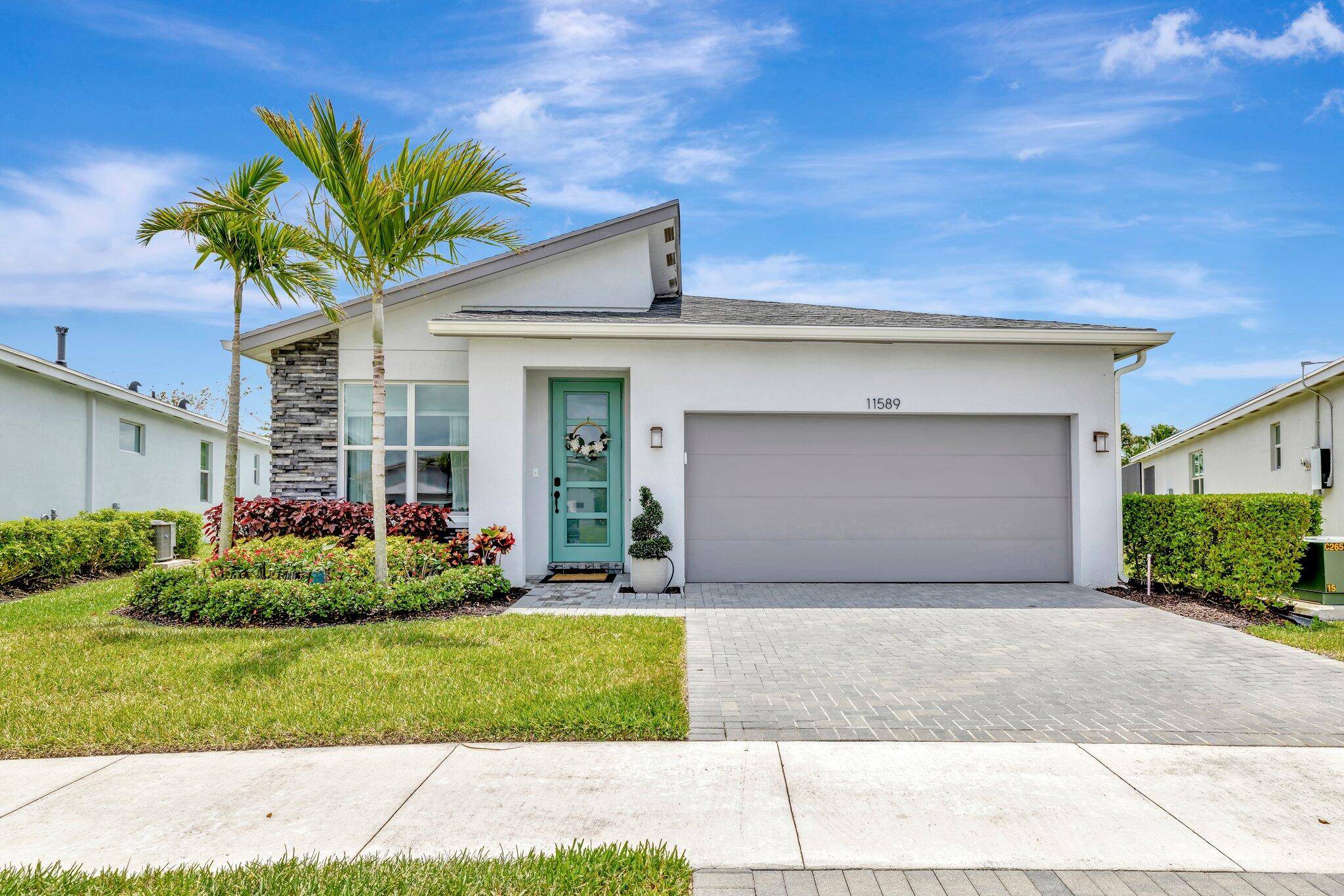 Charming 3 BR Den, 2 BA, 2 CG home in Manderlie at Tradition with open concept filled with natural light, high ceilings.
