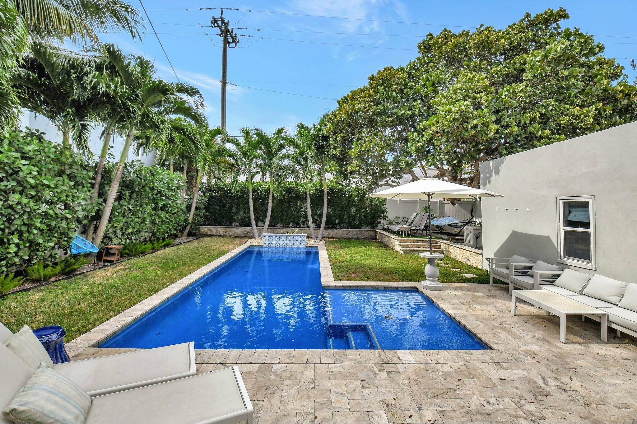 PRICE REDUCED 100K ! MOTIVATED SELLER Open concept fully renovated 3 BR 3BA home with tons of natural light in Prime Downtown Delray location !