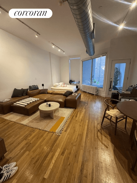 Beautiful, open 850 square ft studio loft with 14 foot ceilings in Prime Tribeca.