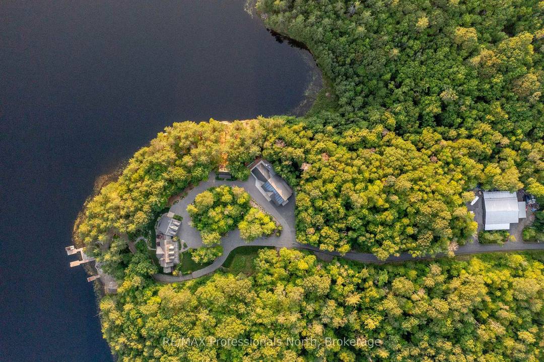 Welcome to Klaxon Lake on Misty Knoll Trail, a once in a lifetime opportunity to own an extraordinary sanctuary nestled in the heart of Ontario's Haliburton Highlands.