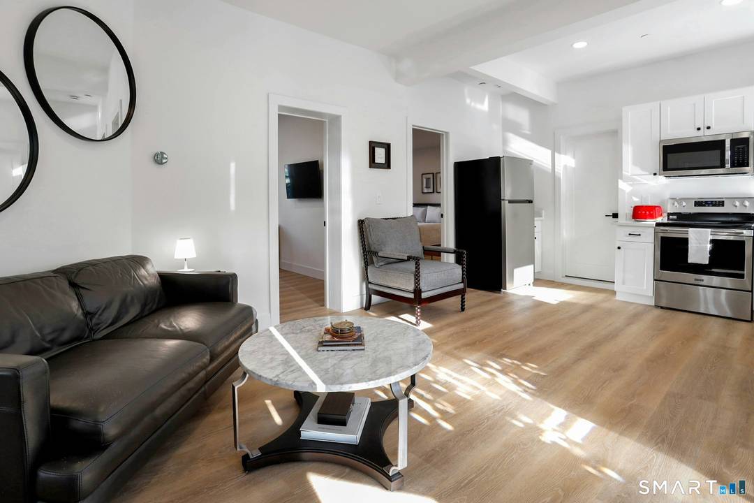 Exceptional turnkey investment opportunity in Stamford's premier waterfront Harbor Point neighborhood.