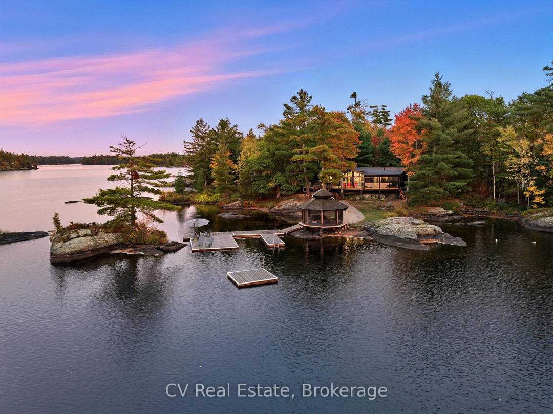 Welcome to an exceptional lakeside retreat on the coveted shores of Kahshe Lake.