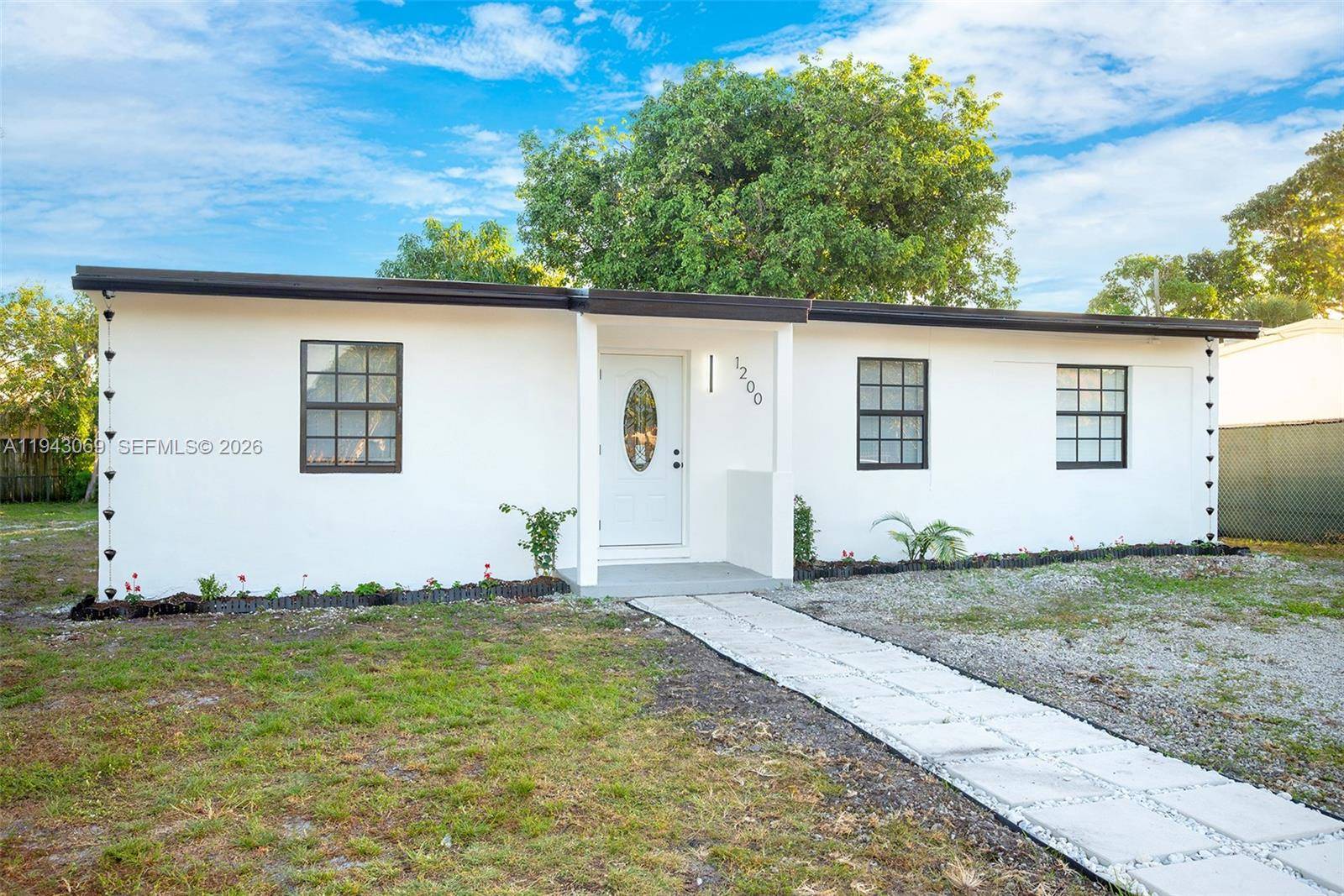 Absolutely stunning 4 bedroom, 2 bath with BRAND NEW ROOF 2025 in the wonderful Neighberhood of Fort Lauderdale 33311.