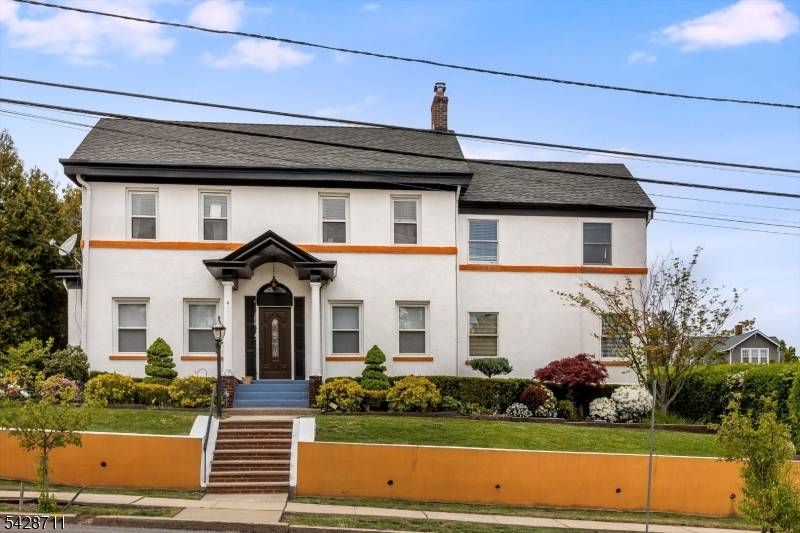 This stunning 1920s center hall colonial effortlessly combines timeless charm with modern comfort.