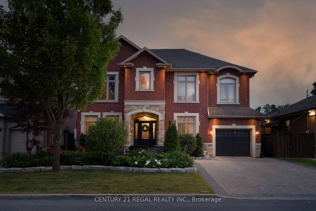 Step into refined living at 127 Sultana Avenue a custom built gem tucked away on a quiet dead end street, just steps from a park.