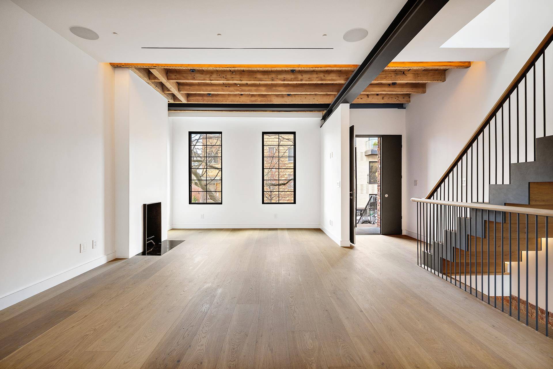 This fully gut renovated custom townhouse on a quiet, tree lined street in Williamsburg blends historic charm with modern, high end finishes throughout.
