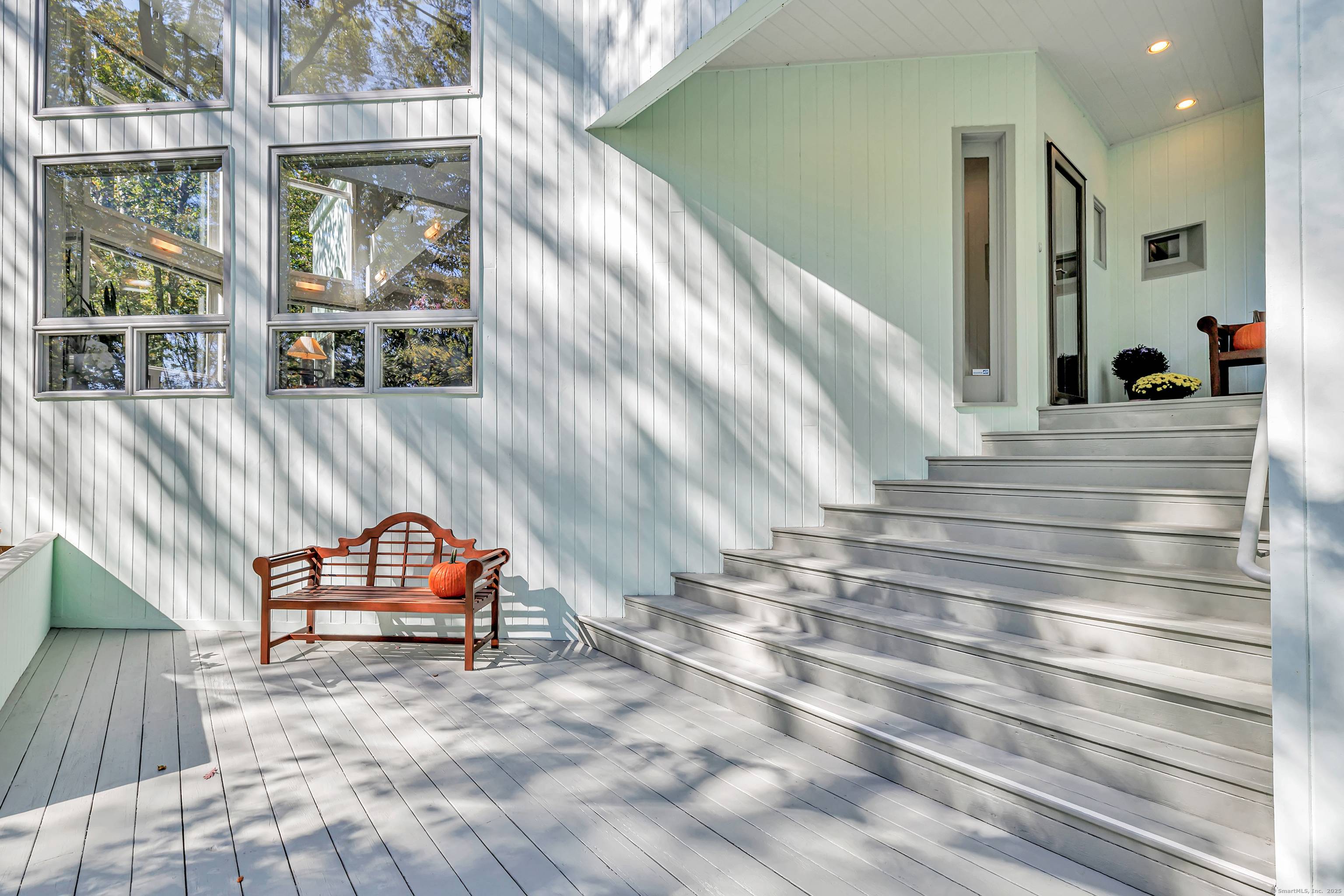 Tucked into the scenic hillside of Hamden's sought after Blue Trail neighborhood on a street lined with architecturally distinctive homes this stunning, one of a kind contemporary offers the perfect ...