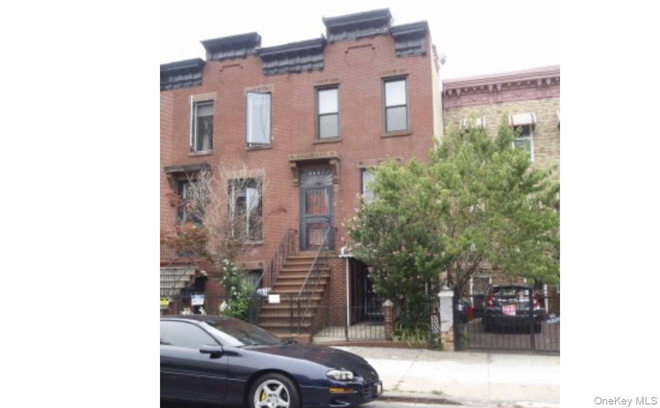 2 Story Large 2 Family Brick, attached House.