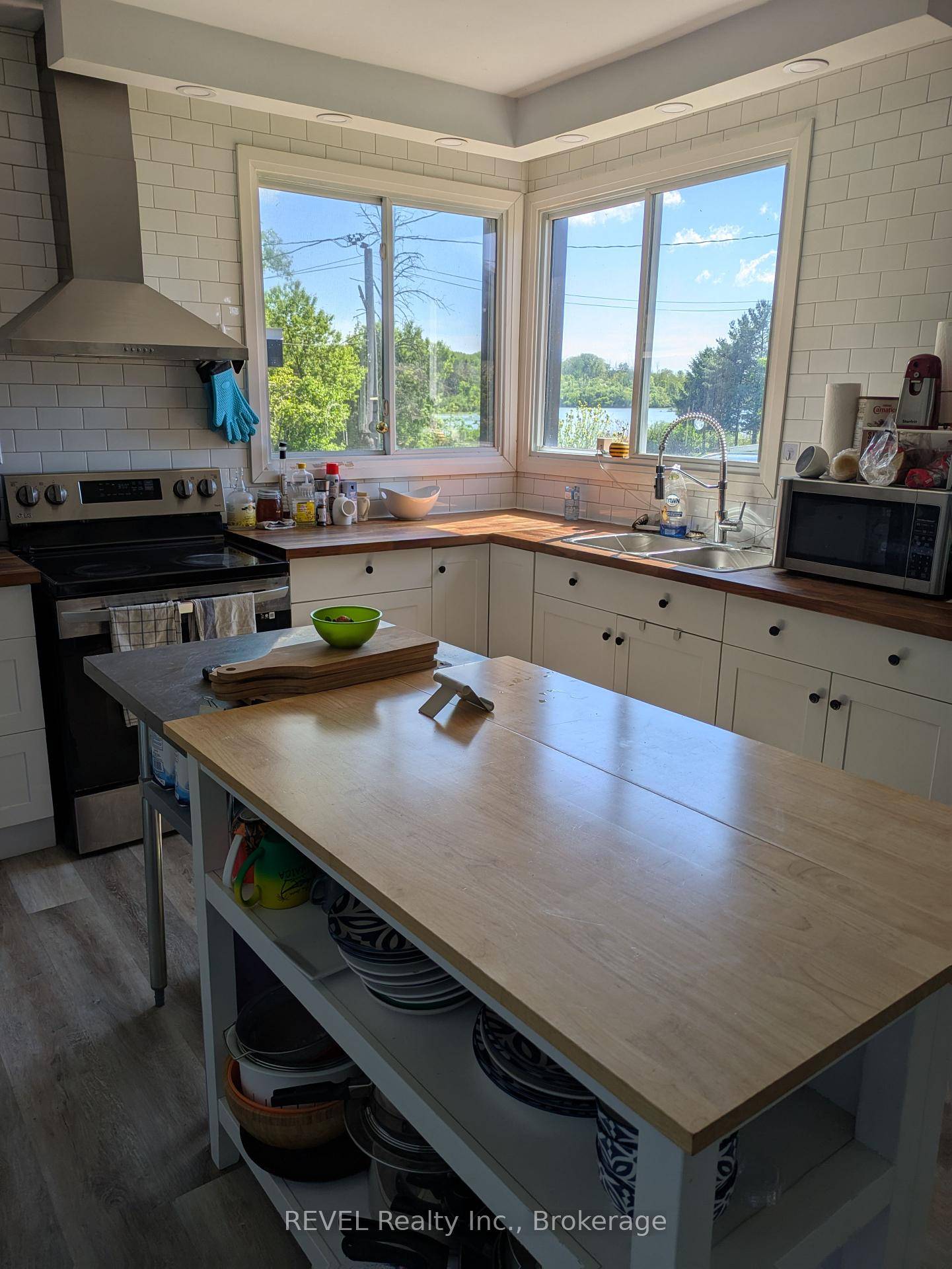 Welcome to this hidden gem with lake views just minutes from the highway.