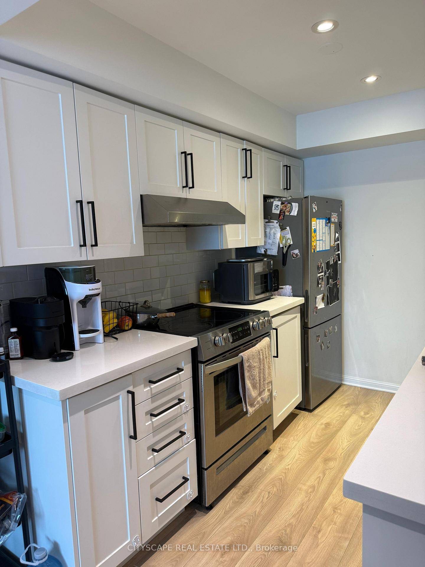 Fully renovated stacked Townhouse, Laminate on both floors 2 Bed and 2 bathrooms, Pot lights and open concept, natural sunlight, Beautiful kitchen with Stainless steel appliances, Close to all amenities.